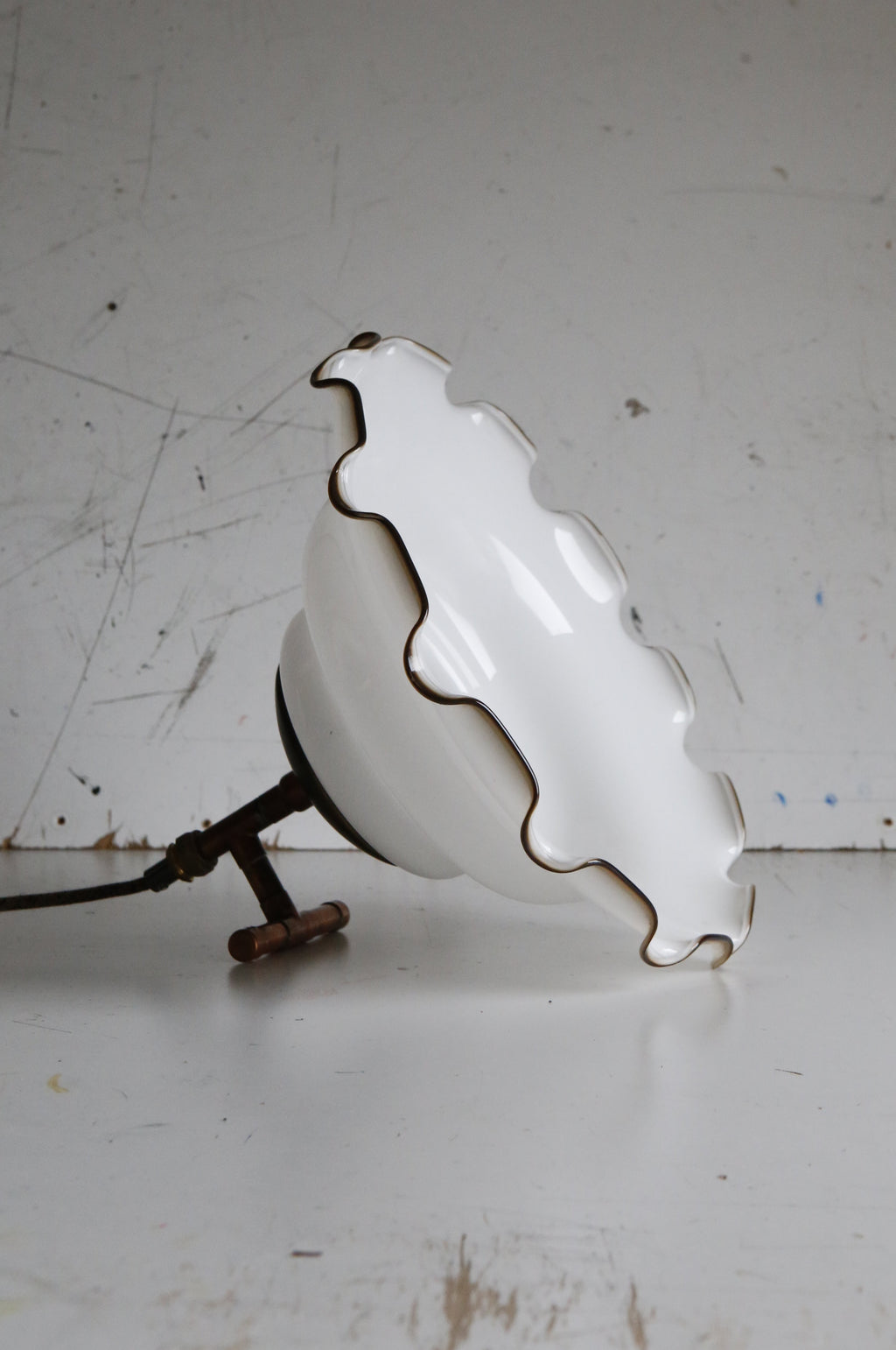 white glass shade turned into table lamp side angle view