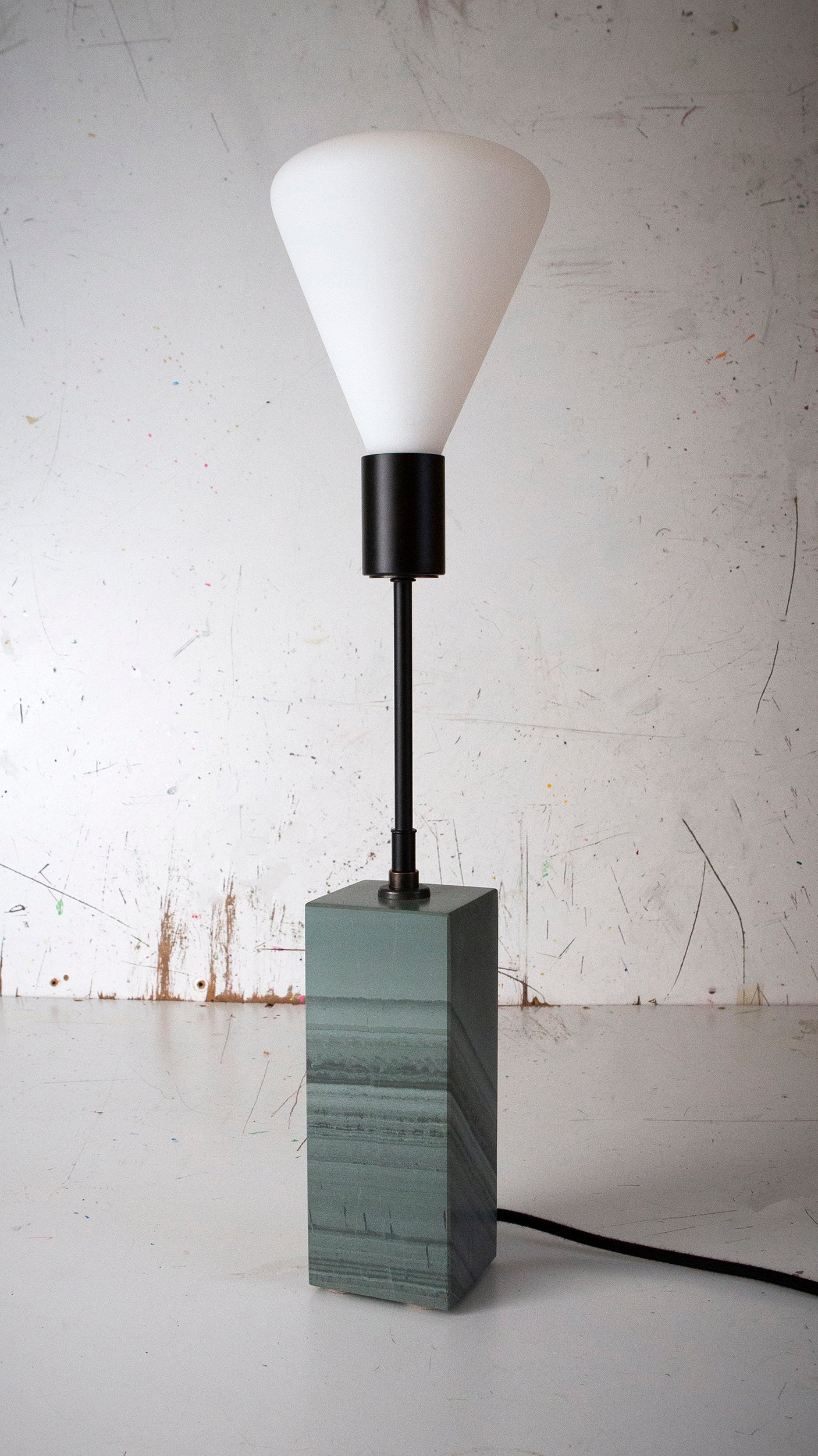 Gorgeously heavy solid slate / stone base reimagined with a 6 inch extension and matt black lamp holder & black cotton cable