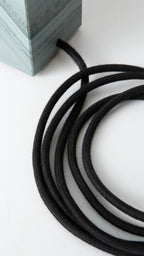 Gorgeously heavy solid slate / stone base reimagined with a 6 inch extension and matt black lamp holder & black cotton cable