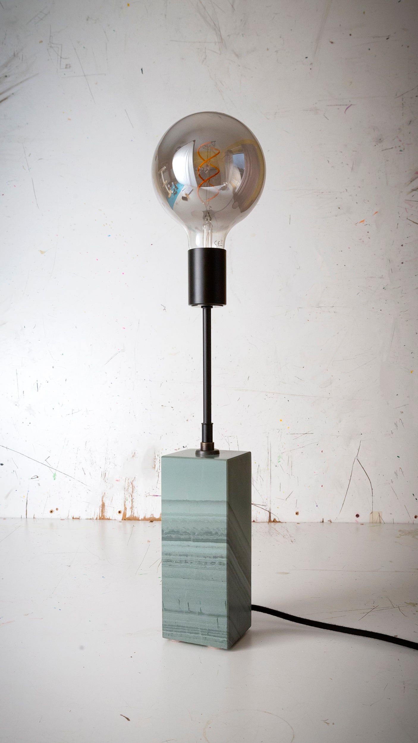 Gorgeously heavy solid slate / stone base reimagined with a 6 inch extension and matt black lamp holder & black cotton cable