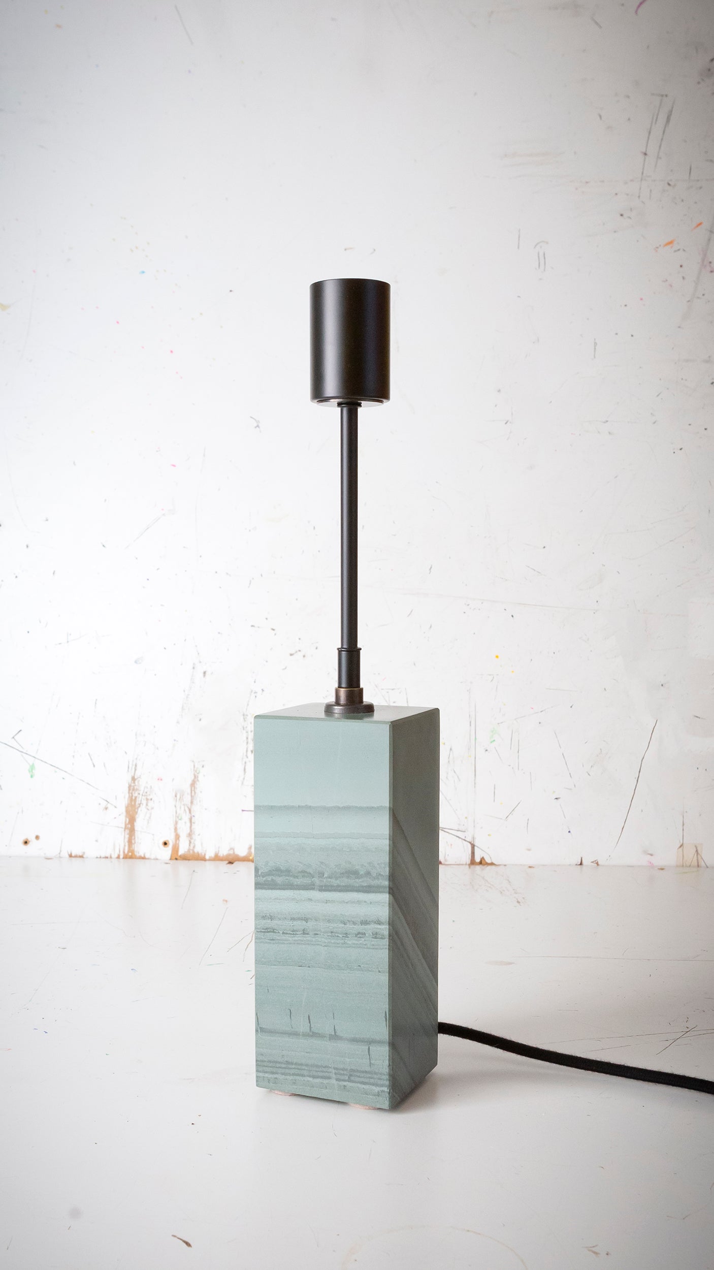 Gorgeously heavy solid slate / stone base reimagined with a 6 inch extension and matt black lamp holder & black cotton cable