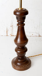 Wooden lamp base on a white background