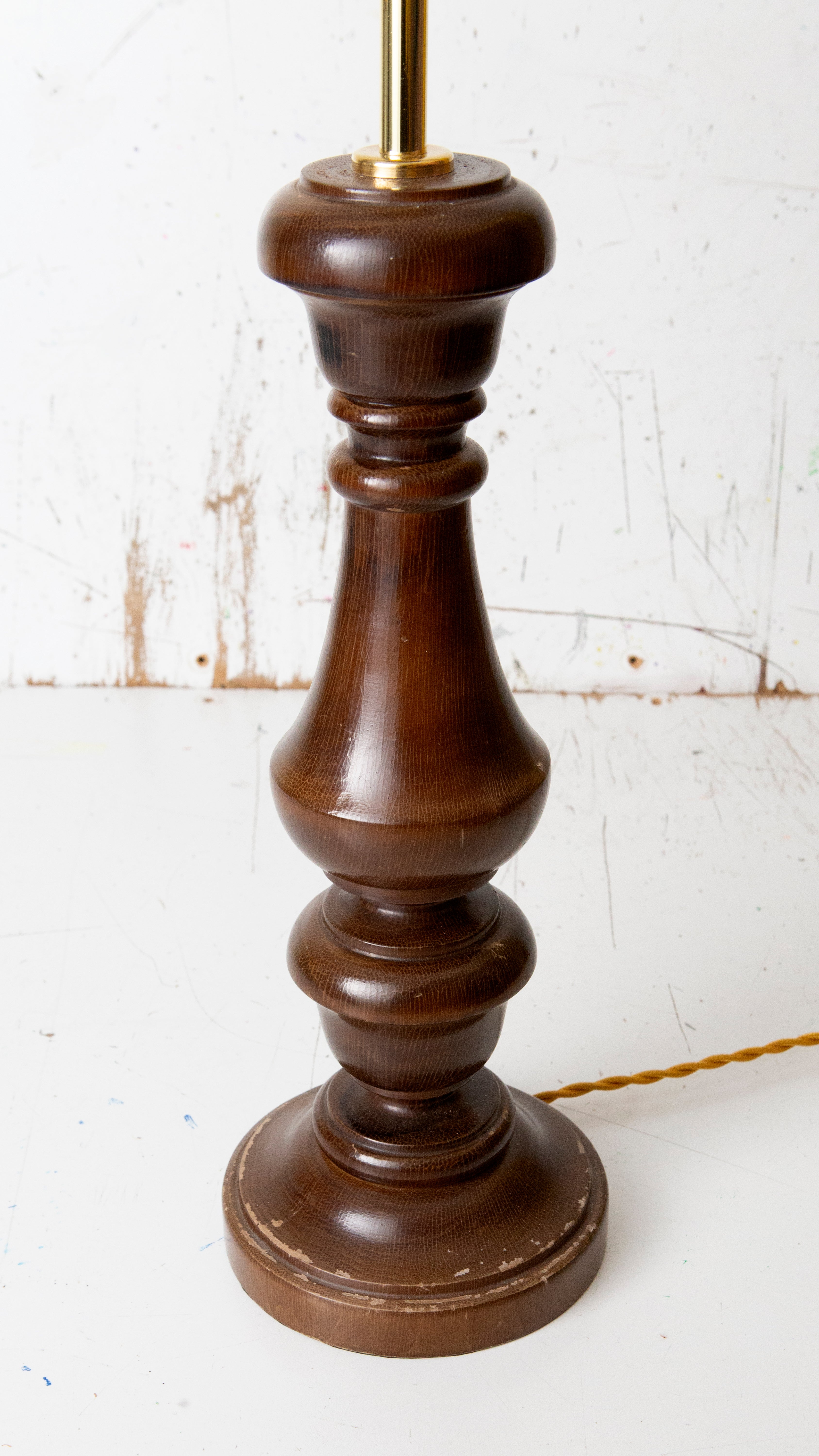 Wooden lamp base on a white background